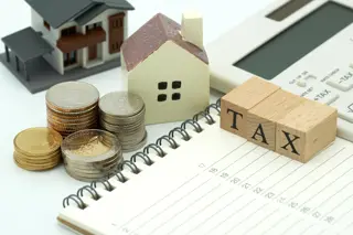 Optimizing NRI Real Estate Investments in Ernakulam: Tax Planning Guide 2025