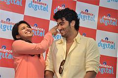 Arjun Kapoor with Parineeti, during a promotional event.